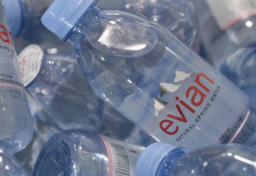 Evian Debuts PET Bottle Made with 100% Recycled Plastic